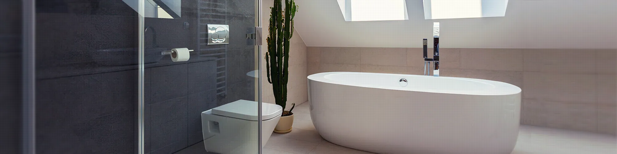 Bathroom renovation with walk-in shower and tiled walls