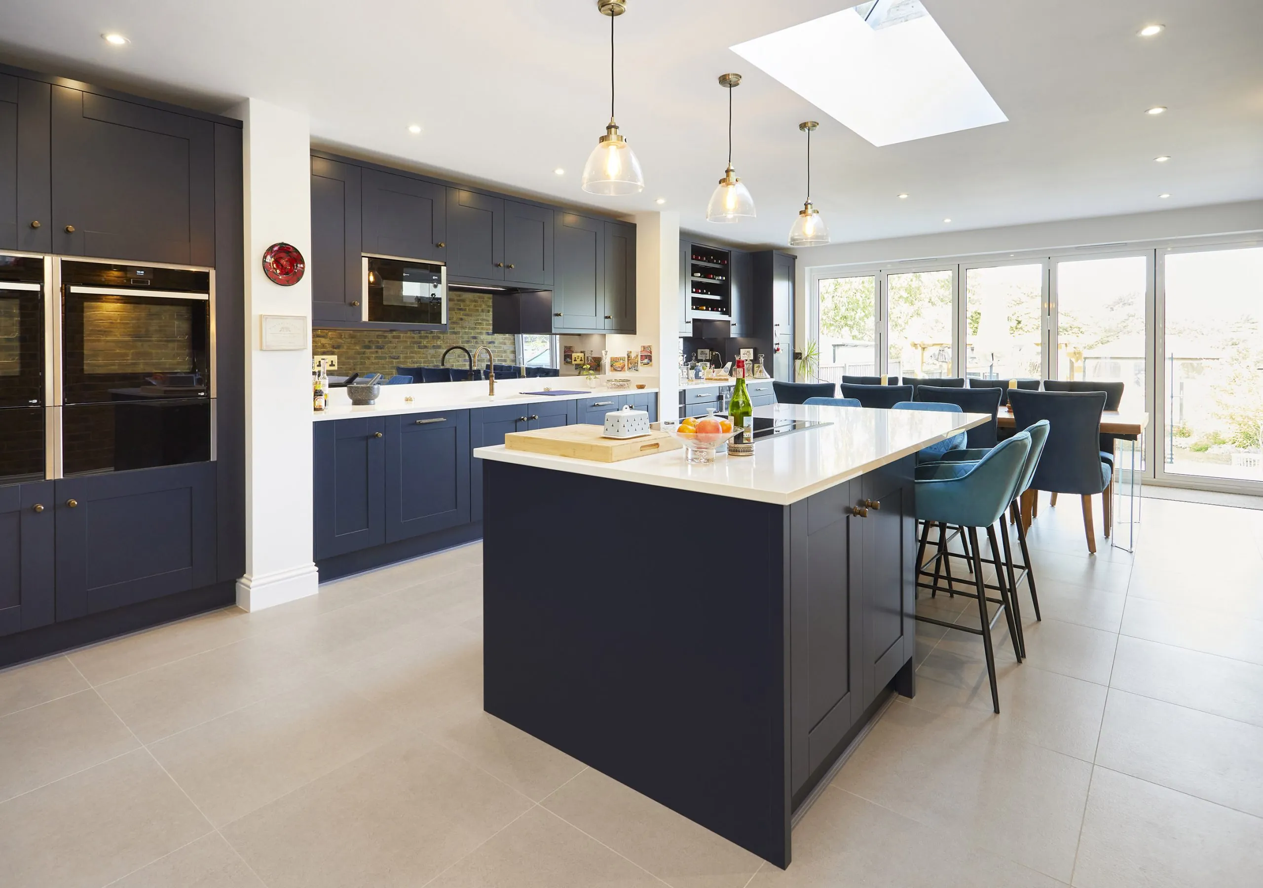 Modern navy shaker kitchen with island and roof lantern