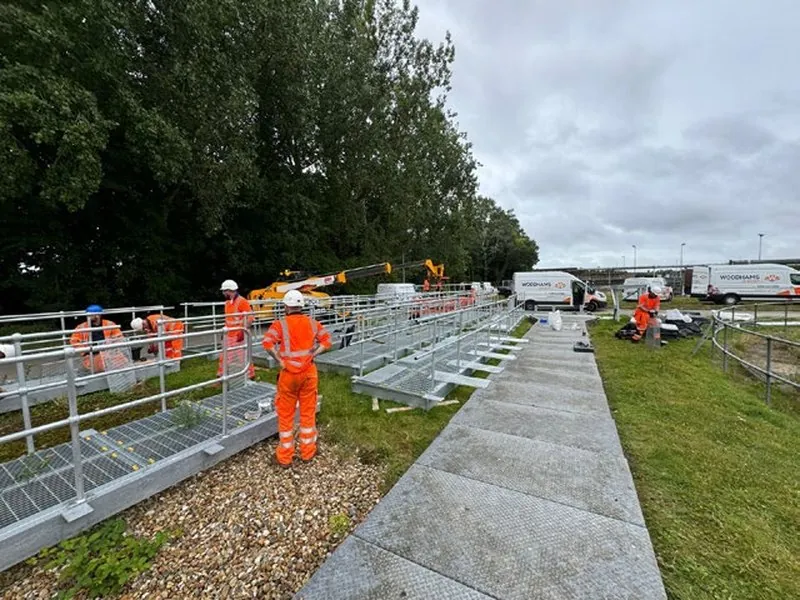 Installation of the 60m access bridge at Holdenhurst WRC, Bournemouth